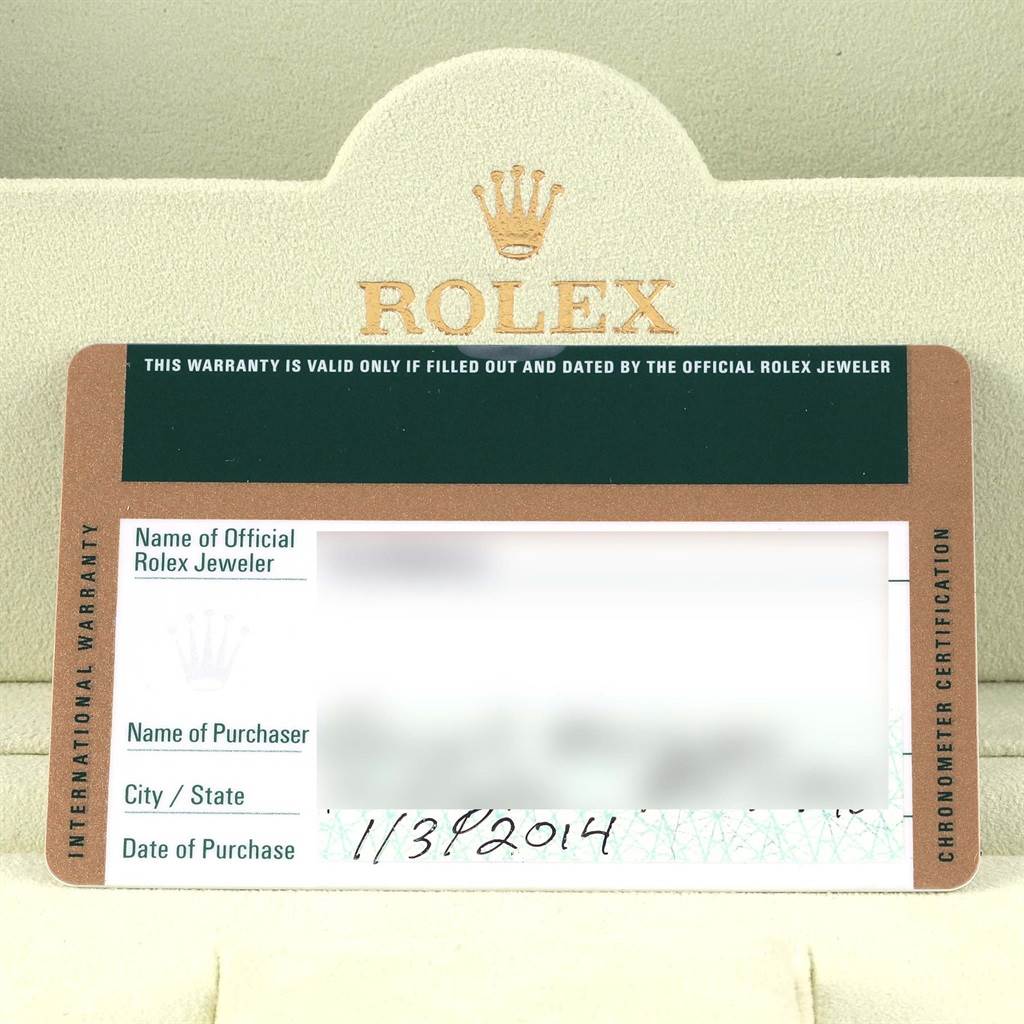 The image shows the International Warranty card for a Rolex Daytona 116523 Men's Steel and Gold (two tone) White Dial 116523 Men's Steel and Gold (two tone) White Dial model.