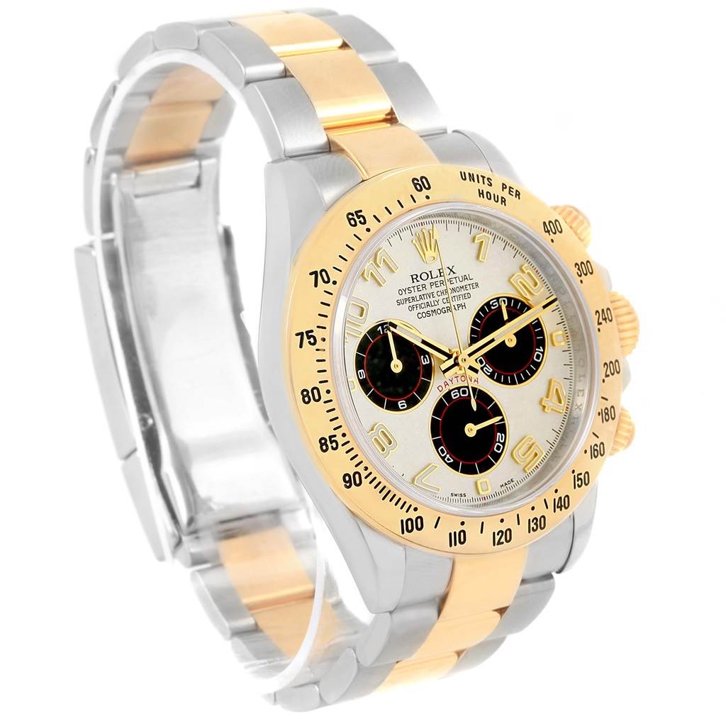 The Rolex Daytona 116523 Men's Steel and Gold (two tone) White Dial 116523 Men's Steel and Gold (two tone) White Dial watch is shown at a three-quarter angle, highlighting its face, bezel, and bracelet.
