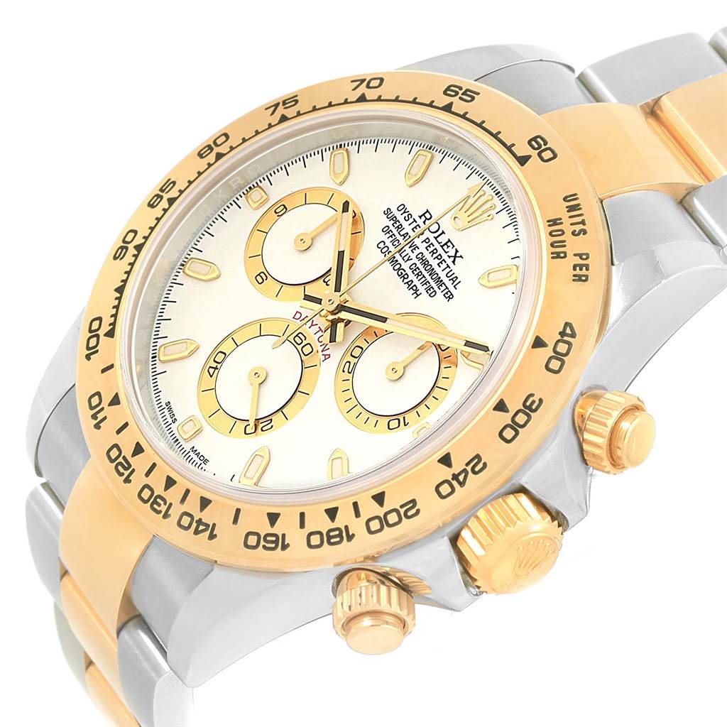 This image shows a close-up, angled view of the Rolex Daytona 116523 Men's Steel and Gold (two tone) White Dial 116523 Men's Steel and Gold (two tone) White Dial watch, highlighting the dial, bezel, crown, and bracelet.