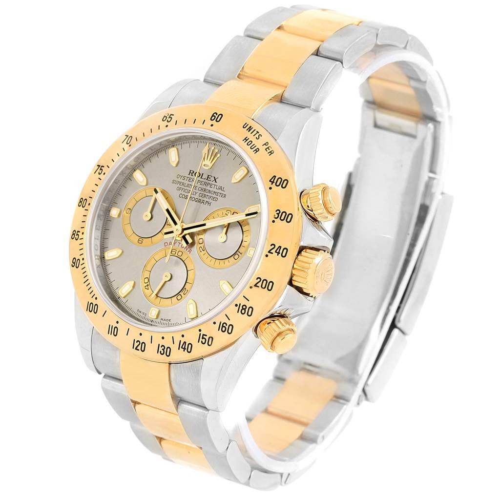 This image shows a Rolex Daytona 116523 Men's Steel and Gold (two tone) Grey Dial 116523 Men's Steel and Gold (two tone) Grey Dial watch at a slight angle, highlighting the dial, bezel, pushers, and two-tone bracelet.