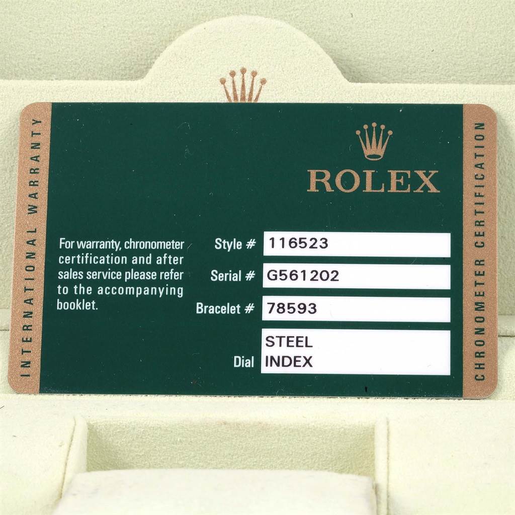 The image shows the International Warranty card for the Rolex Daytona 116523 Men's Steel and Gold (two tone) Grey Dial 116523 Men's Steel and Gold (two tone) Grey Dial model, displaying style, serial, bracelet, and dial details.