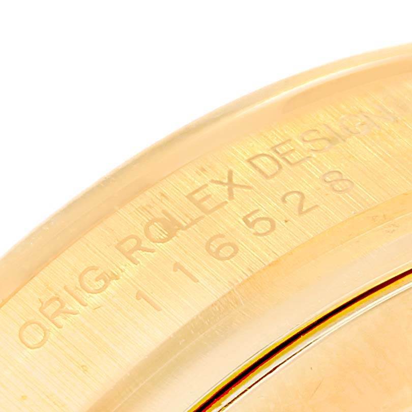 This image shows a close-up of the engraved reference number on the case of a Rolex Daytona 116528 Men's Yellow Gold Black Dial 116528 Men's Yellow Gold Black Dial watch.