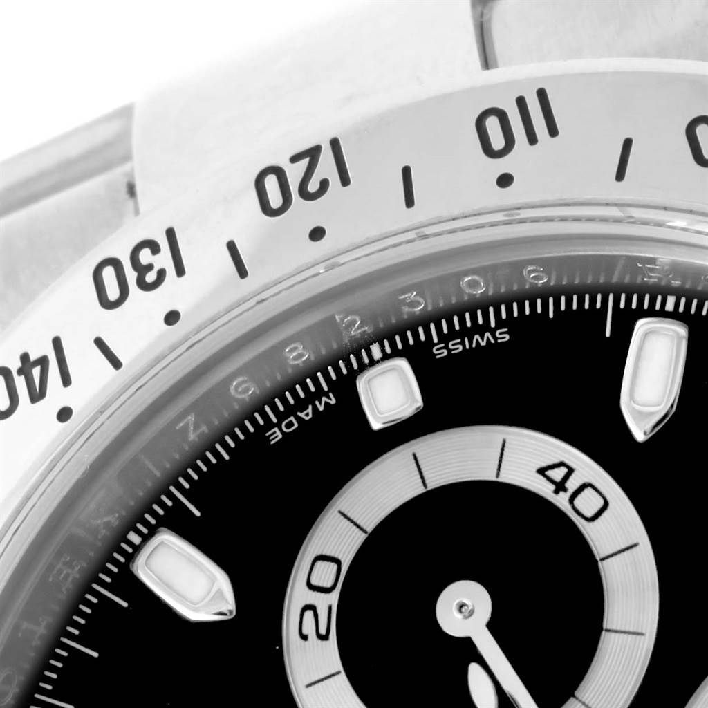 This close-up angle of a Rolex Daytona 116520 Men's Stainless Steel Black Dial 116520 Men's Stainless Steel Black Dial watch shows part of the bezel, dial, and sub-dial.