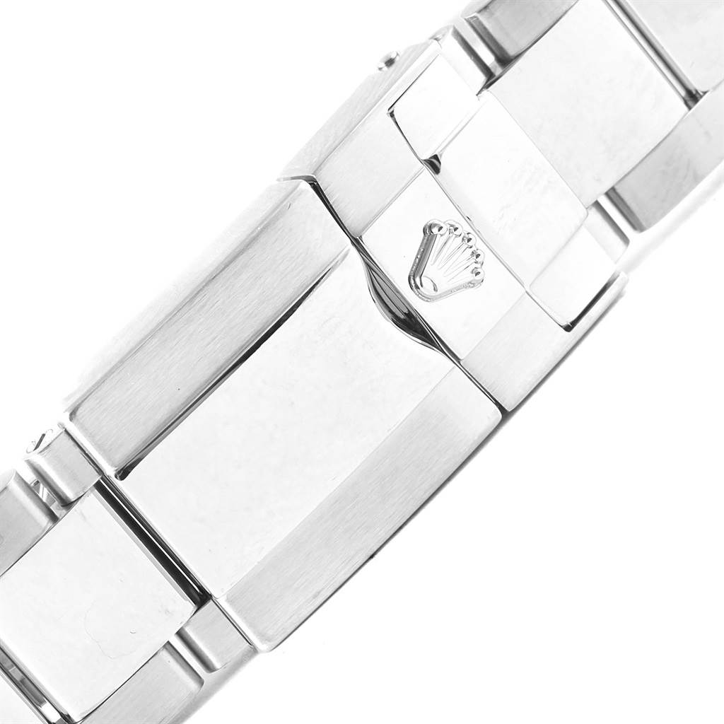 The image shows a close-up view of the clasp and links of a Rolex Daytona 116520 Men's Stainless Steel Black Dial 116520 Men's Stainless Steel Black Dial watch bracelet.