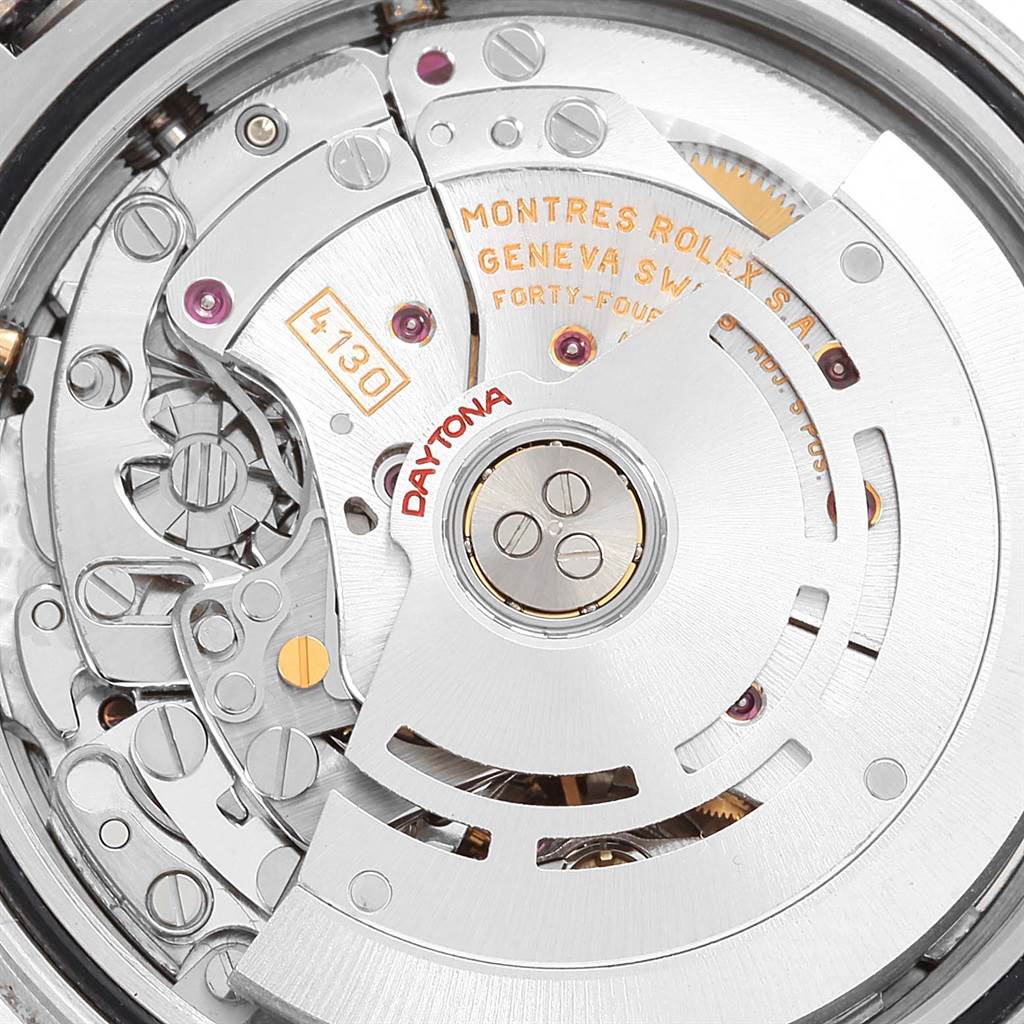 The image shows a close-up view of the movement mechanism of a Rolex Daytona 116523 Men's Steel and Gold (two tone) Mother of Pearl Dial 116523 Men's Steel and Gold (two tone) Mother of Pearl Dial watch from the back.