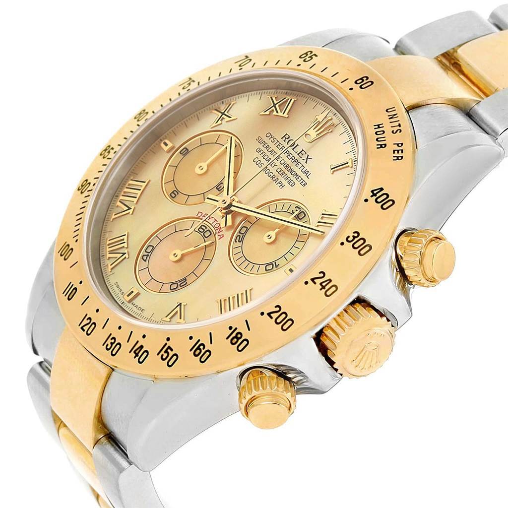 The image shows a side angle of the Rolex Daytona 116523 Men's Steel and Gold (two tone) Mother of Pearl Dial 116523 Men's Steel and Gold (two tone) Mother of Pearl Dial watch, highlighting the dial, bezel, pushers, and part of the bracelet.
