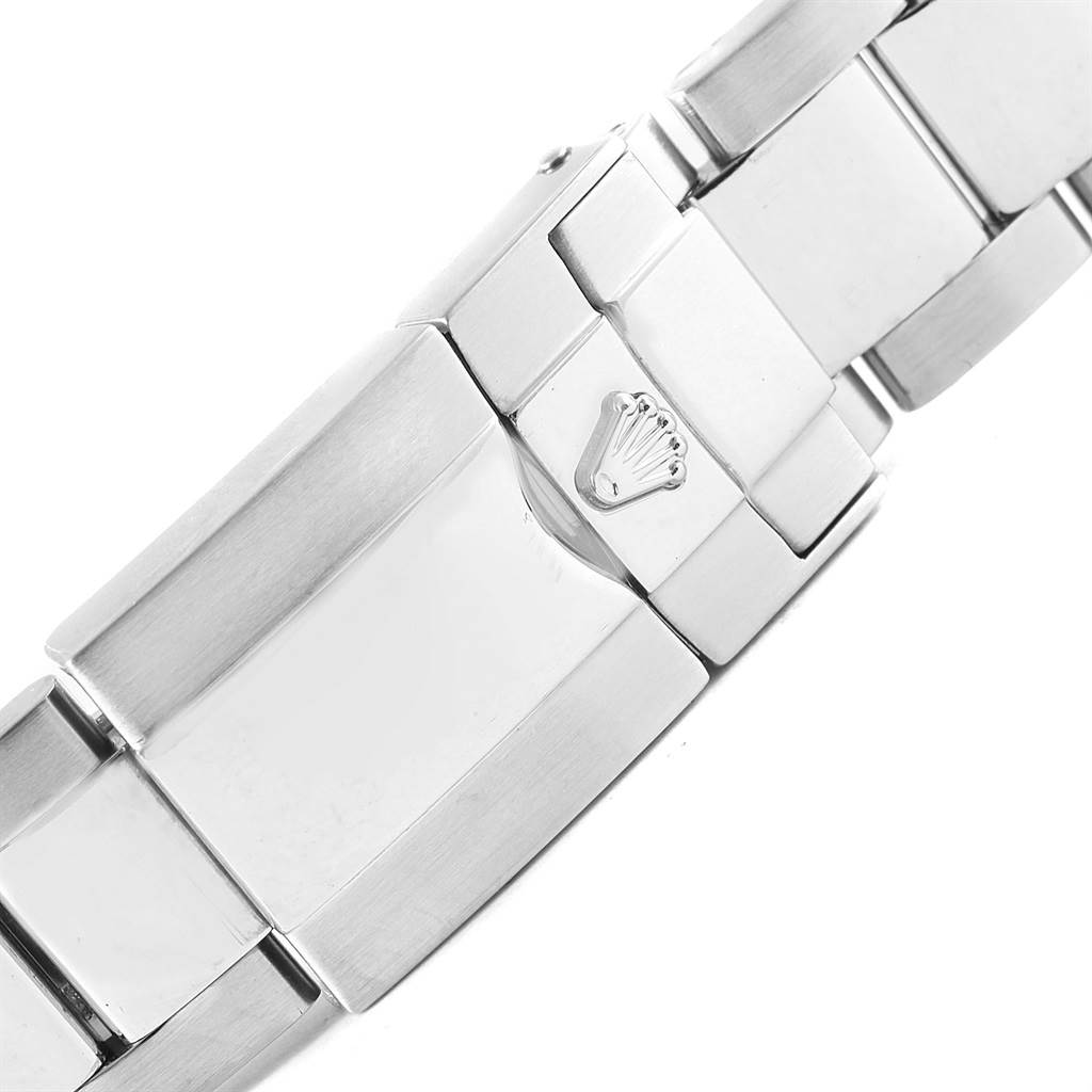 The image shows the clasp of a Rolex Daytona 116520 Men's Stainless Steel Black Dial 116520 Men's Stainless Steel Black Dial watch bracelet at a close-up angle.