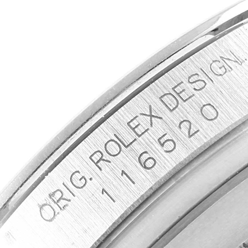 The image shows a close-up of the casing with the model number 116520 engraved on the Rolex Daytona 116520 Men's Stainless Steel Black Dial 116520 Men's Stainless Steel Black Dial watch.