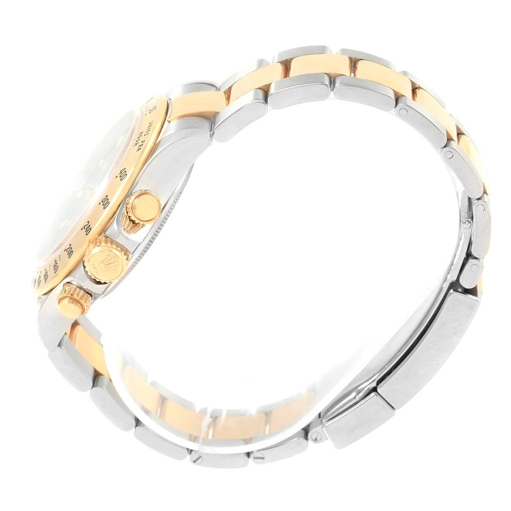 This side view of the Rolex Daytona 116523 Men's Stainless Steel Grey Dial 116523 Men's Stainless Steel Grey Dial watch showcases its bracelet and crown.