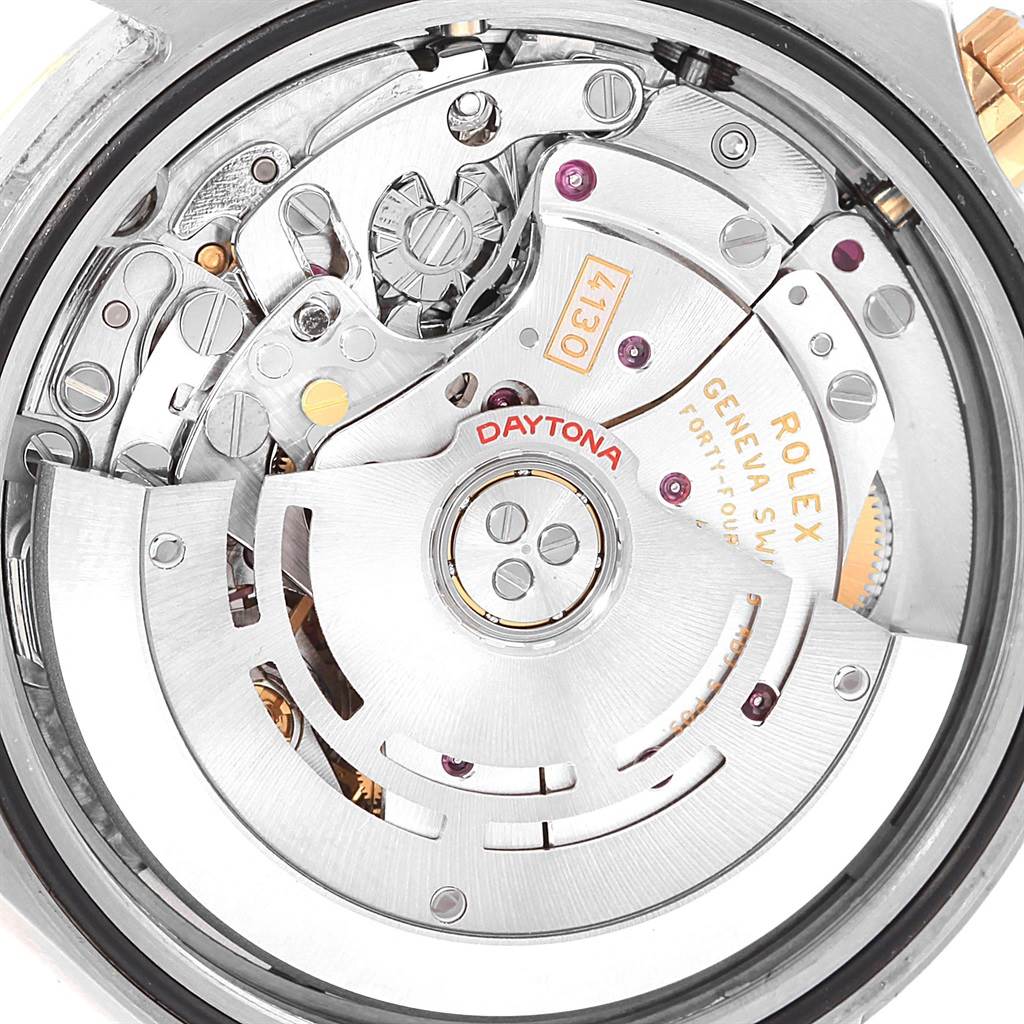 This image shows the intricate inner mechanisms of a Rolex Daytona 116523 Men's Steel and Gold (two tone) Black Dial 116523 Men's Steel and Gold (two tone) Black Dial watch, viewed from the back.