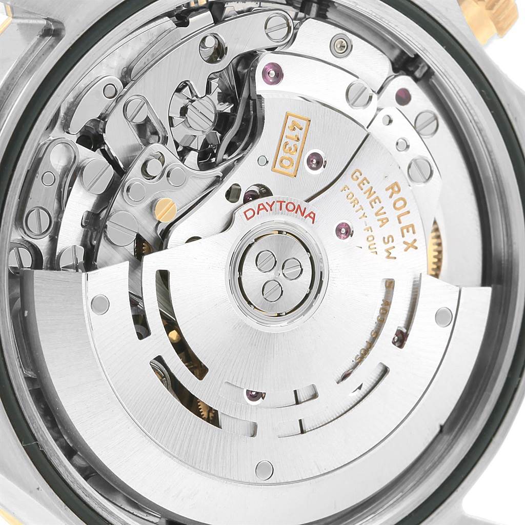 The image shows the intricate mechanical movement of a Rolex Daytona 116523 Men's Steel and Gold (two tone) White Dial 116523 Men's Steel and Gold (two tone) White Dial watch from a close-up, rear angle.