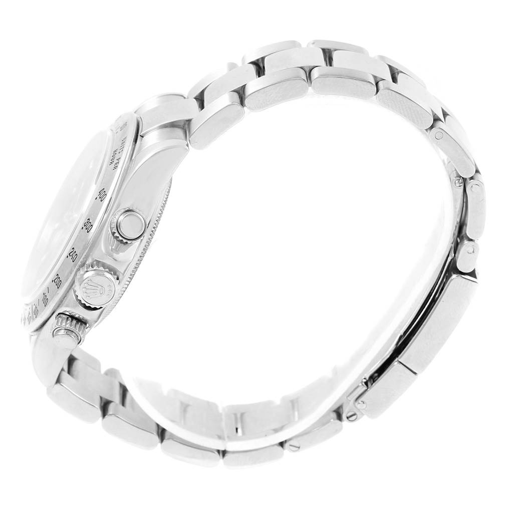 This image shows a side view of a Rolex Daytona 116520 Men's Stainless Steel Black Dial 116520 Men's Stainless Steel Black Dial watch, showcasing the crown, pushers, and part of the bracelet.