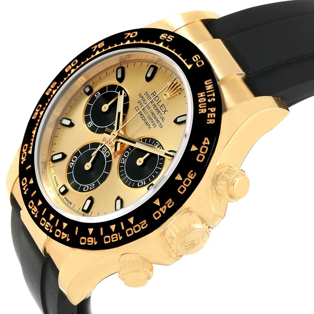 The image shows a close-up angle of the Rolex Daytona 116518 Men's Yellow Gold Champagne Dial 116518 Men's Yellow Gold Champagne Dial watch, highlighting the face, bezel, crown, and part of the strap.