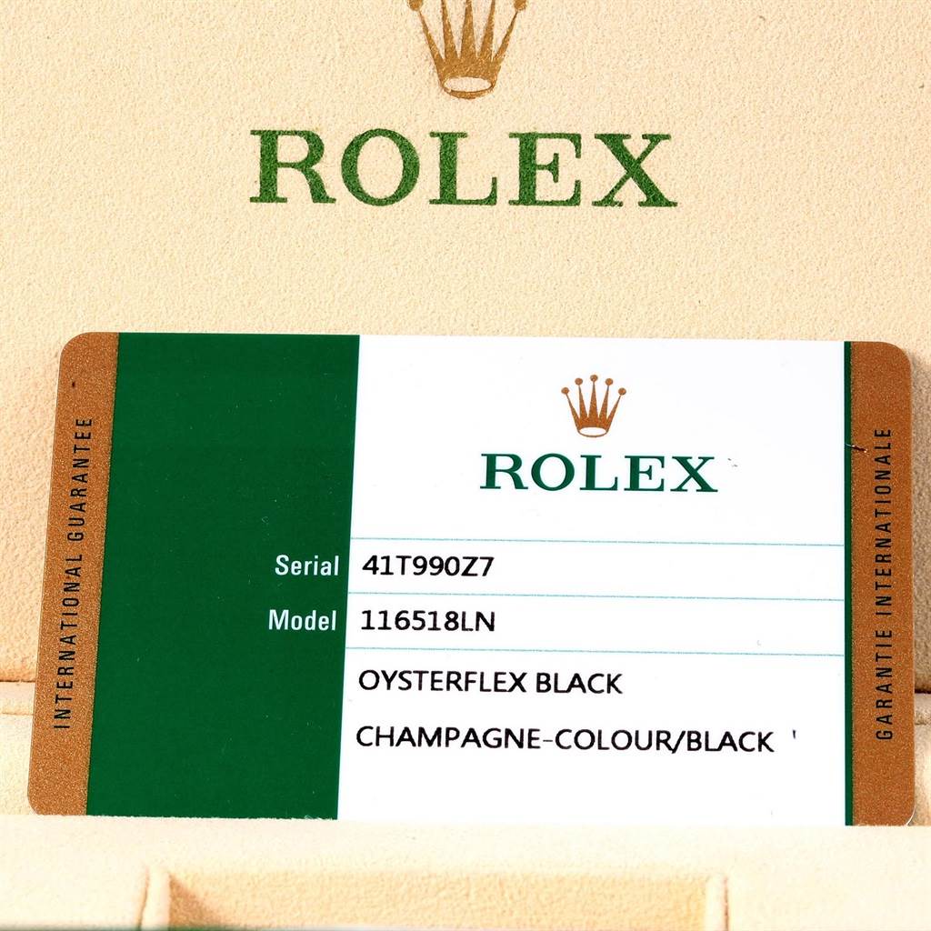 This is a close-up image of the Rolex guarantee card for the Daytona model 116518LN with an Oysterflex black strap.