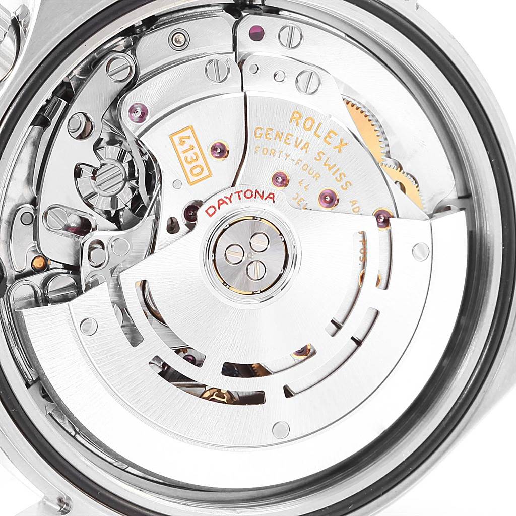 The image shows the intricate inner mechanics and rotor of a Rolex Daytona 116520 Men's Stainless Steel White Dial 116520 Men's Stainless Steel White Dial watch, viewed from the back.