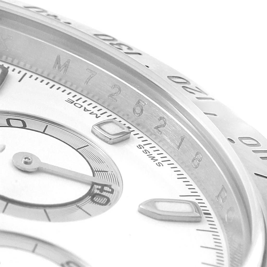 This close-up image shows the dial and bezel of a Rolex Daytona 116520 Men's Stainless Steel White Dial 116520 Men's Stainless Steel White Dial watch, highlighting the markers and chronograph sub-dials.
