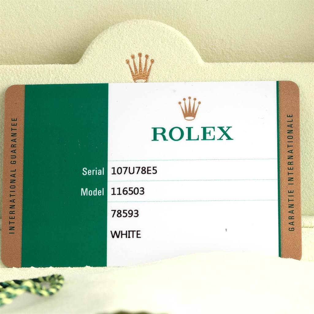The image showcases the warranty card for a Rolex Daytona 116503 Men's Steel and Gold (two tone) White Dial 116503 Men's Steel and Gold (two tone) White Dial Model 116503 watch, displaying serial and model numbers.