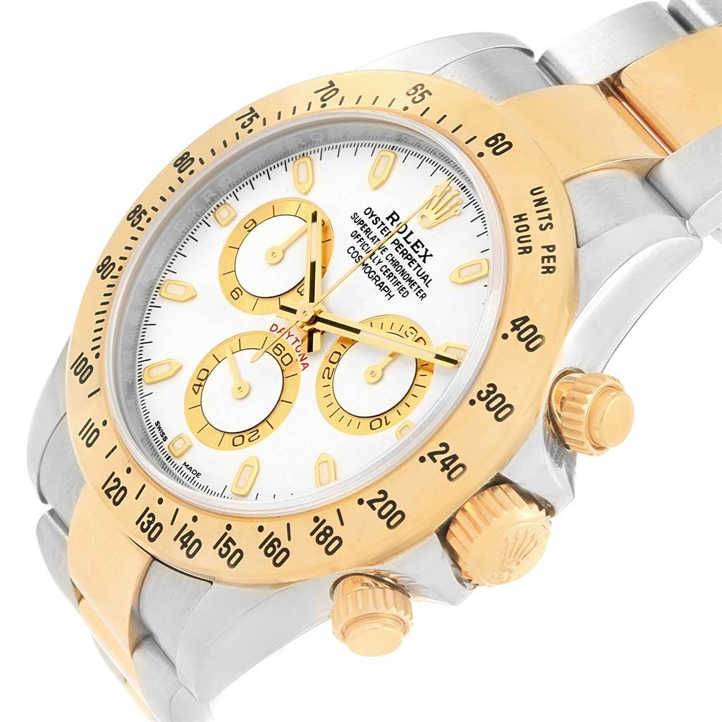 The image shows a close-up angle of the Rolex Daytona 116503 Men's Steel and Gold (two tone) White Dial 116503 Men's Steel and Gold (two tone) White Dial watch, highlighting the dial, bezel, crown, and chronograph pushers.