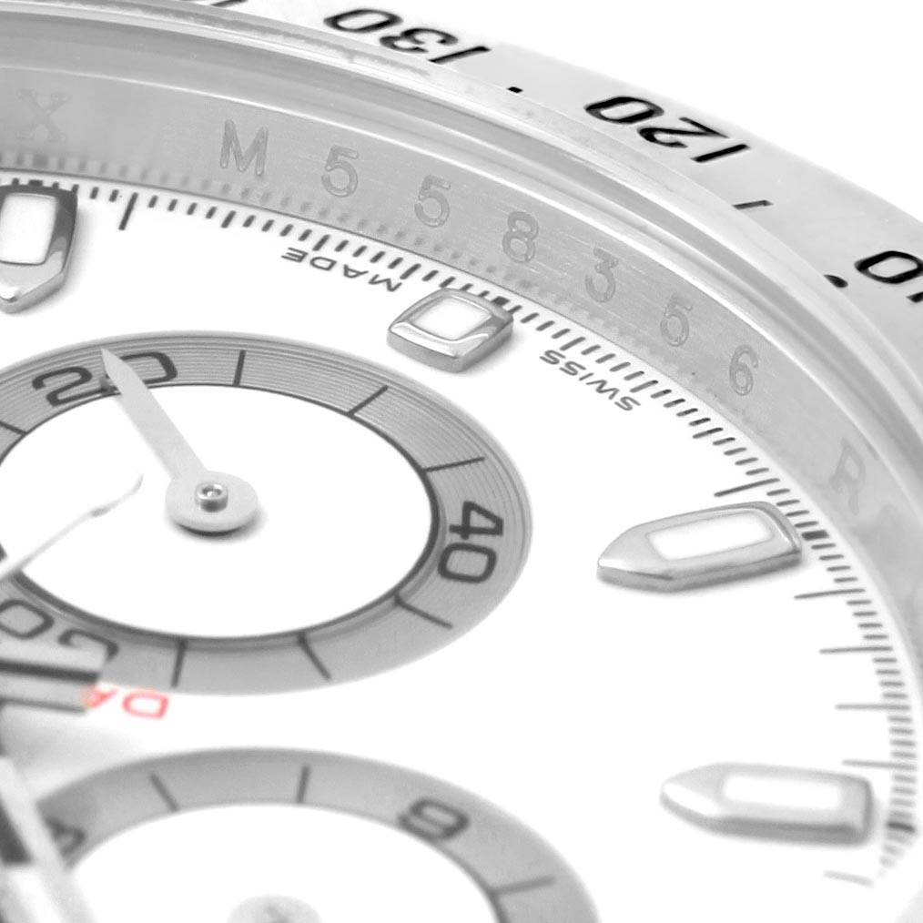 Close-up of the dial and outer ring of a Rolex Daytona 116520 Men's Stainless Steel White Dial 116520 Men's Stainless Steel White Dial watch, showing subdials, indices, and part of the tachymeter bezel.
