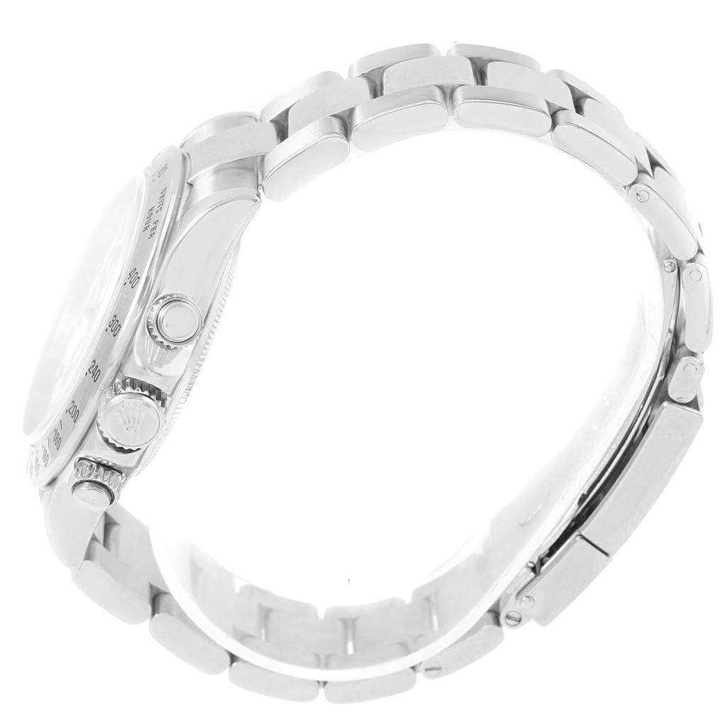 The image shows a side view of a Rolex Daytona 116520 Men's Stainless Steel White Dial 116520 Men's Stainless Steel White Dial watch, highlighting its bracelet, crown, and pushers.