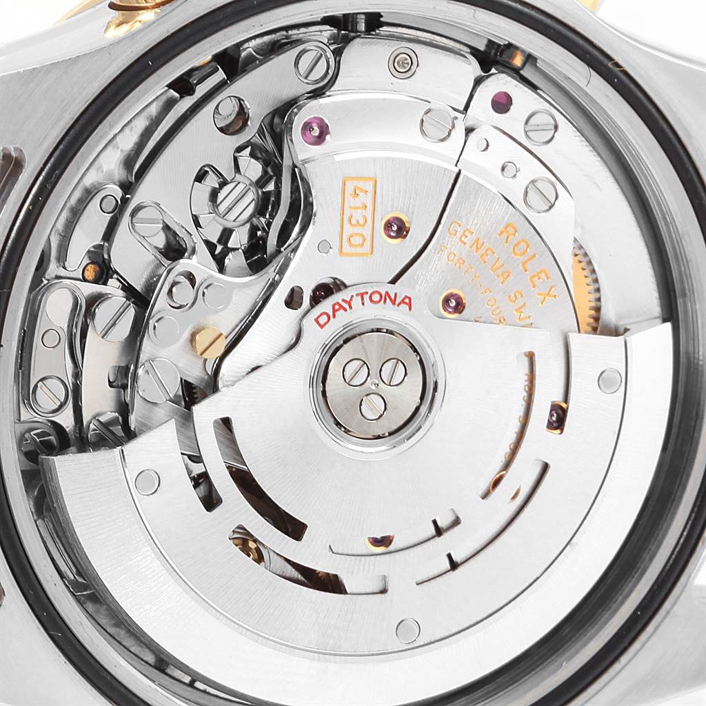 The image shows a close-up of the movement mechanism of the Rolex Daytona 116523 Men's Steel and Gold (two tone) Black Dial 116523 Men's Steel and Gold (two tone) Black Dial watch model.