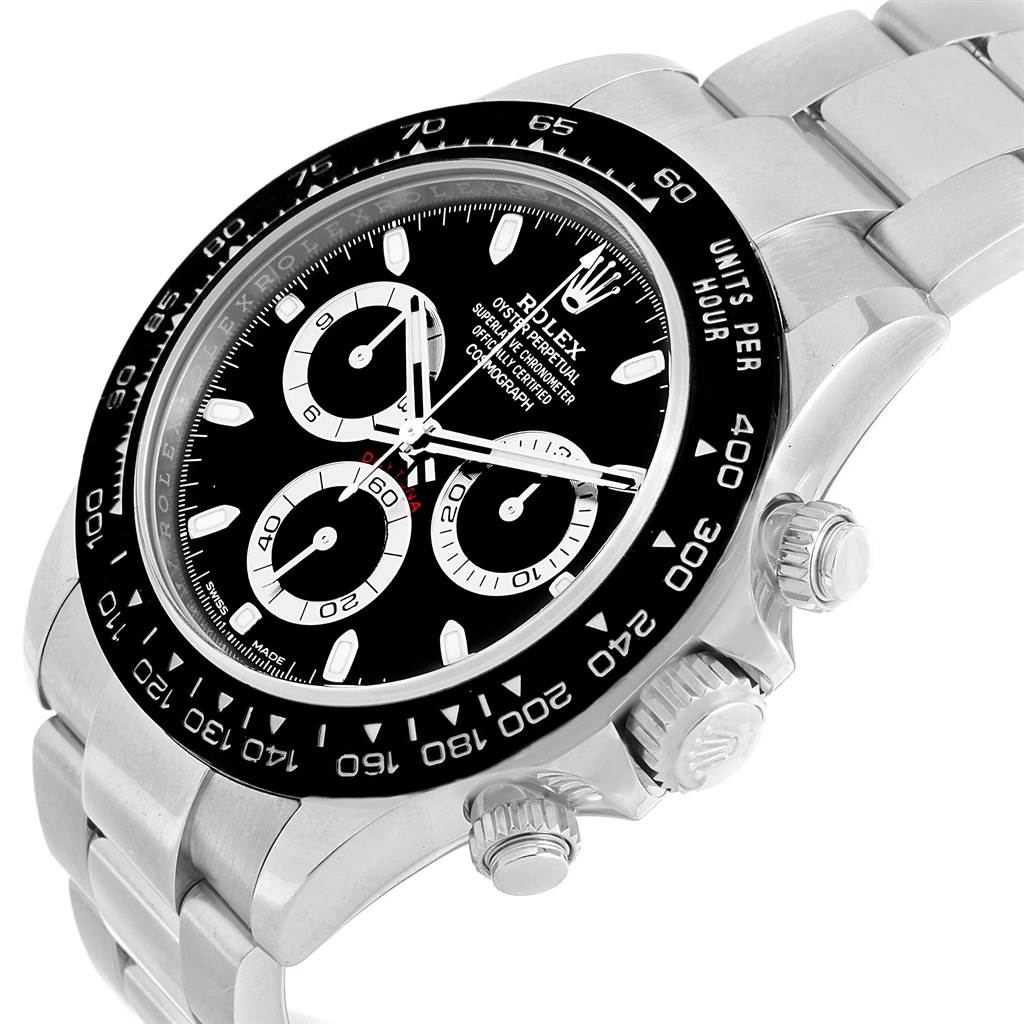 The image shows a close-up angle of a Rolex Daytona 116500 Men's Stainless Steel Black Dial 116500 Men's Stainless Steel Black Dial, highlighting its bezel, dial, sub-dials, and chronograph pushers.