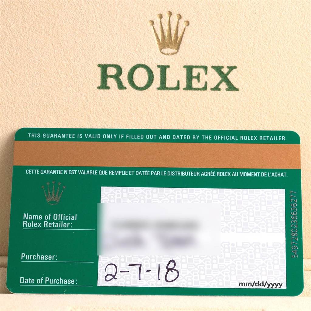 This image shows the guarantee card for a Rolex Daytona 116500 Men's Stainless Steel Black Dial 116500 Men's Stainless Steel Black Dial, including the brand logo and purchase details.