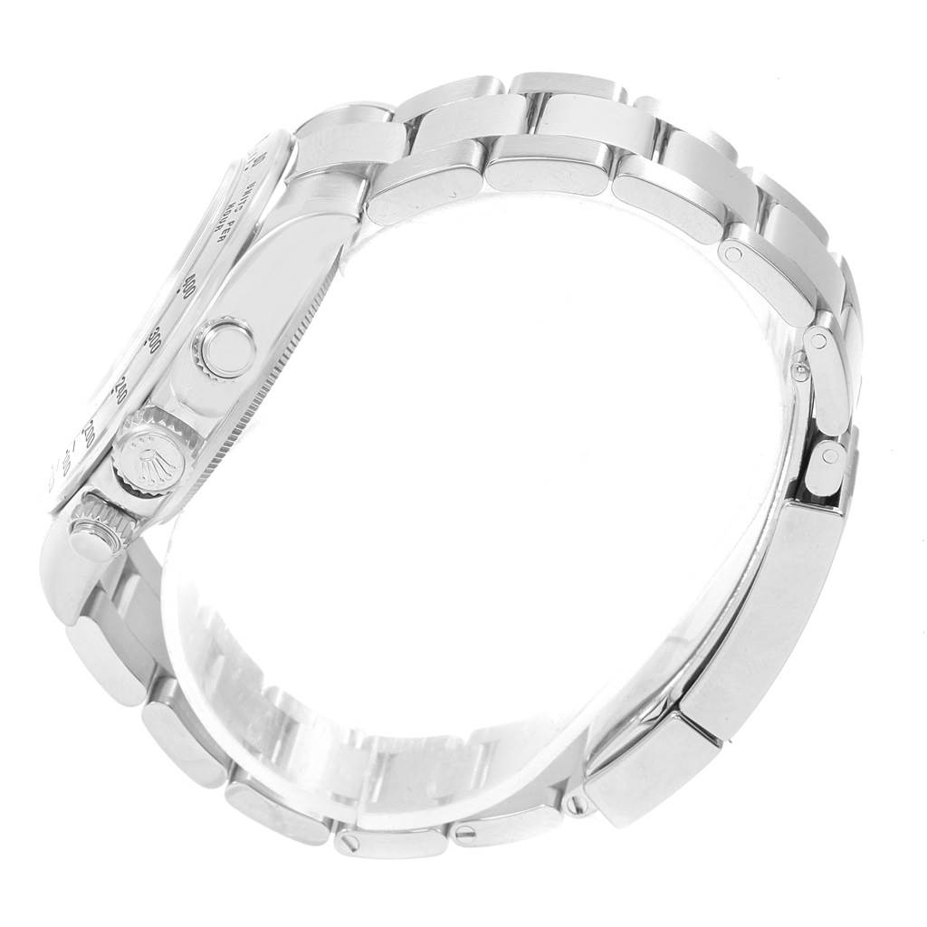 The image shows a side view of the Rolex Daytona 116520 Men's Stainless Steel White Dial 116520 Men's Stainless Steel White Dial watch, highlighting the bracelet, crown, and pushers.