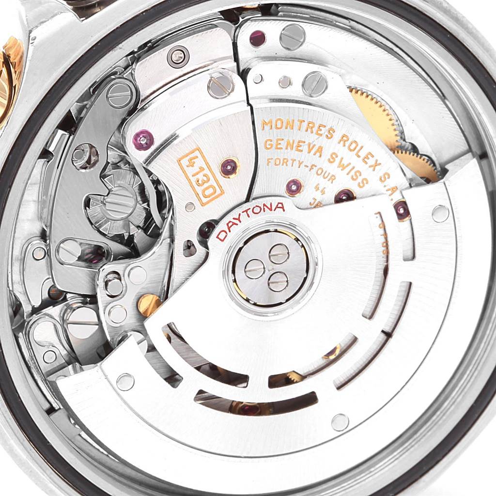 This image shows a close-up view of the movement mechanism inside a Rolex Daytona 116523 Men's Steel and Gold (two tone) Mother of Pearl Dial 116523 Men's Steel and Gold (two tone) Mother of Pearl Dial watch.