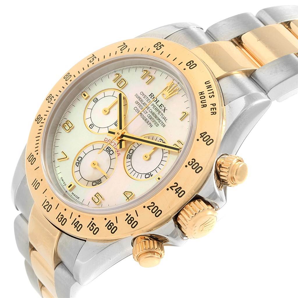 The image shows a Rolex Daytona 116523 Men's Steel and Gold (two tone) Mother of Pearl Dial 116523 Men's Steel and Gold (two tone) Mother of Pearl Dial watch at an angle highlighting its face, bezel, crown, pushers, and a portion of its band.