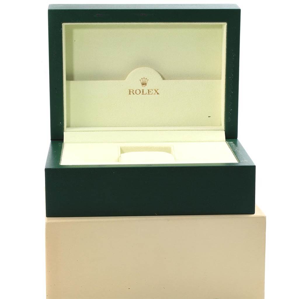This image shows an open, empty Rolex Daytona 116523 Men's Steel and Gold (two tone) Mother of Pearl Dial 116523 Men's Steel and Gold (two tone) Mother of Pearl Dial watch box, with the inside lining and holder visible from a front angle.