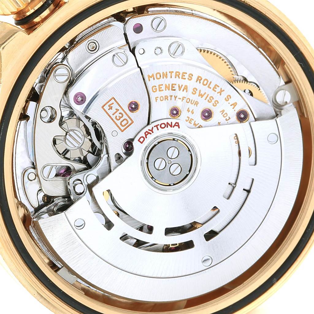 The image shows a close-up of the movement and internal components of a Rolex Daytona 116528 Men's Yellow Gold Champagne Dial 116528 Men's Yellow Gold Champagne Dial watch.