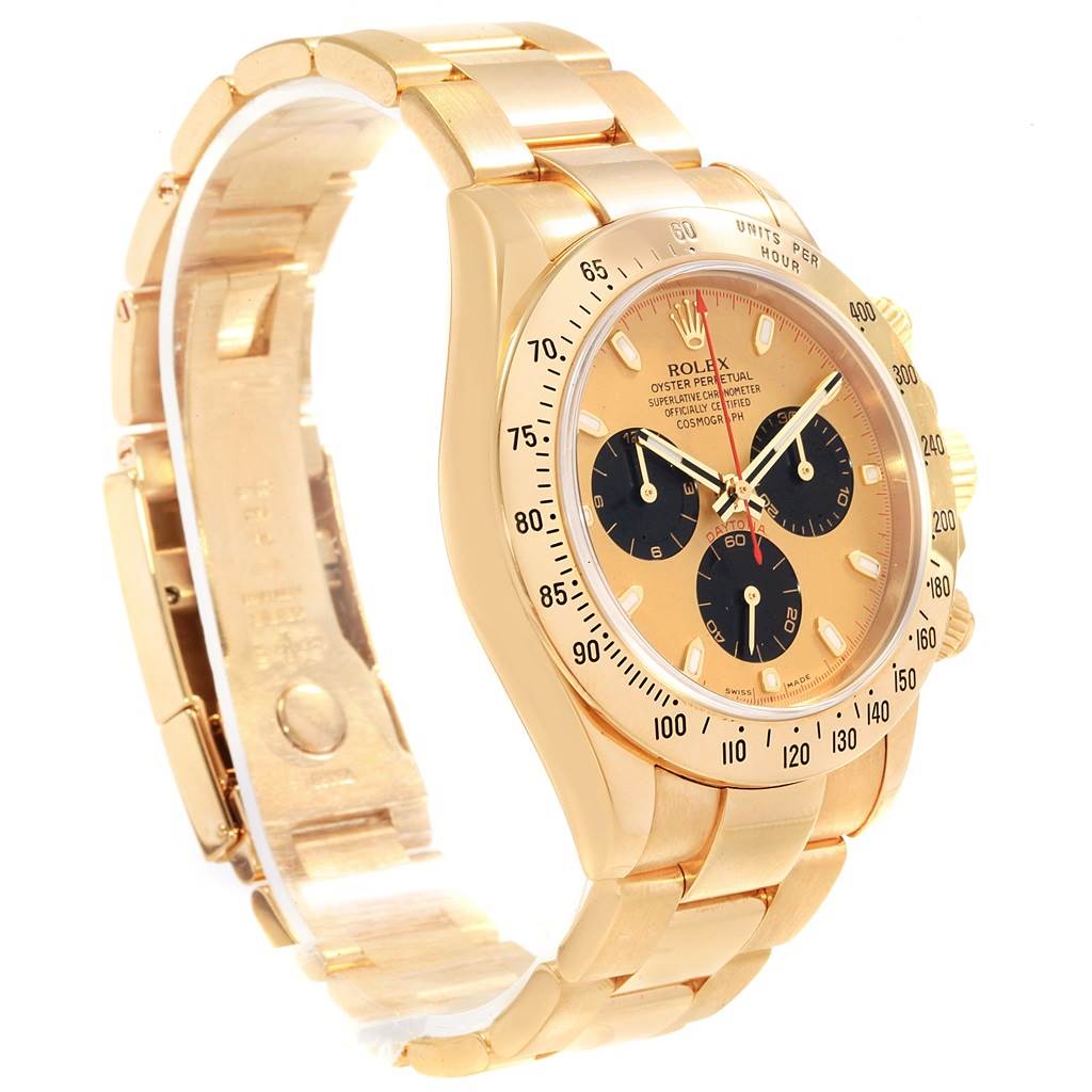 This Rolex Daytona 116528 Men's Yellow Gold Champagne Dial 116528 Men's Yellow Gold Champagne Dial watch is shown at an angle displaying the face, bezel, and bracelet.