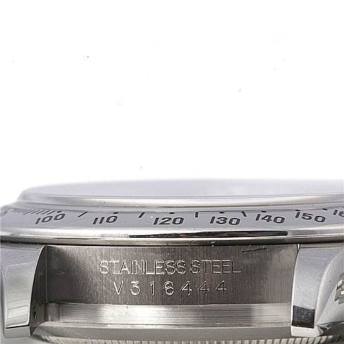 This image shows a side view of the watch case and bezel of a Rolex Daytona 116520 Men's Stainless Steel Black Dial 116520 Men's Stainless Steel Black Dial model, highlighting the stainless steel material and serial number.