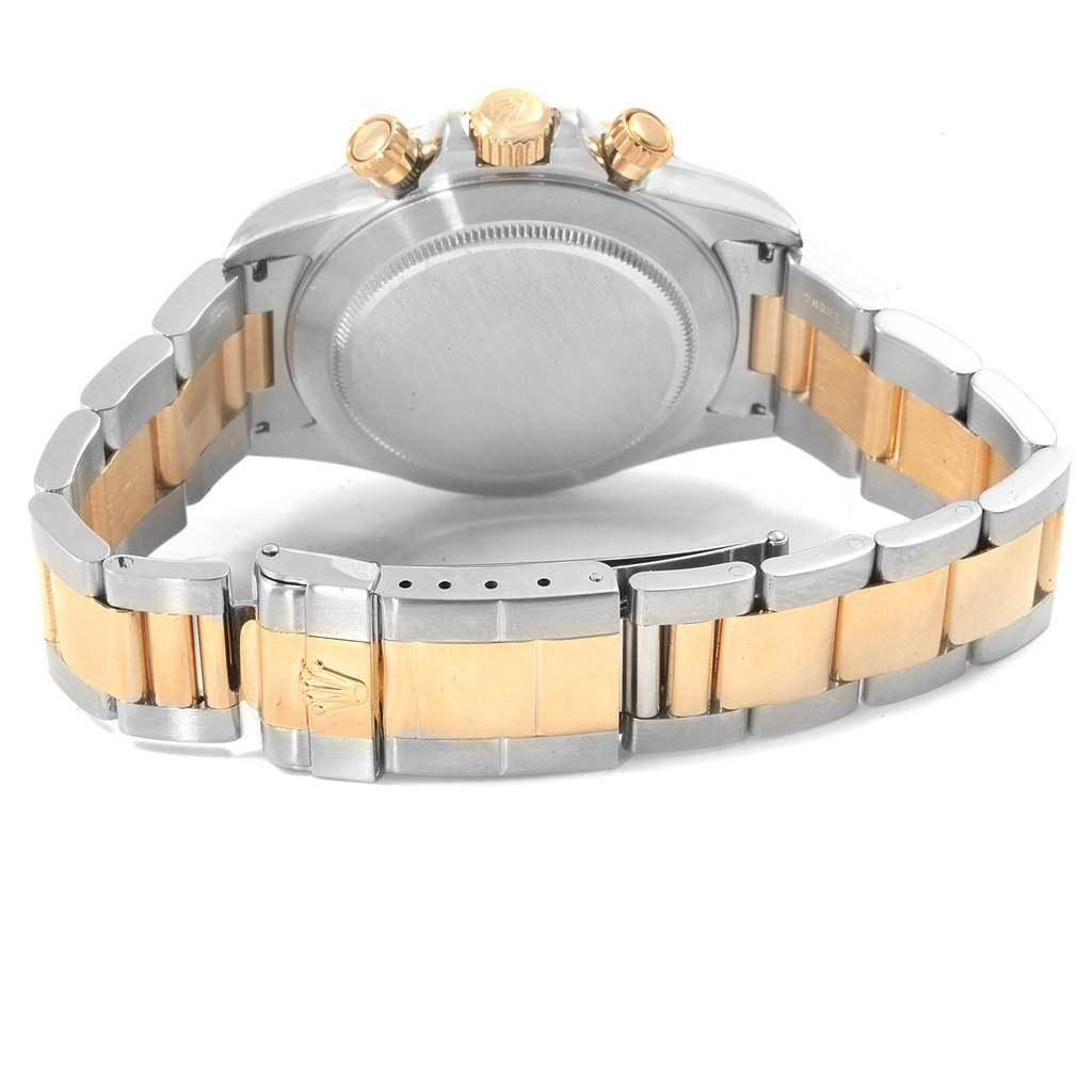 The image shows the back view of a Rolex Daytona 16523 Men's Steel and Gold (two tone) White Dial 16523 Men's Steel and Gold (two tone) White Dial watch, highlighting its bracelet, clasp, and case back.