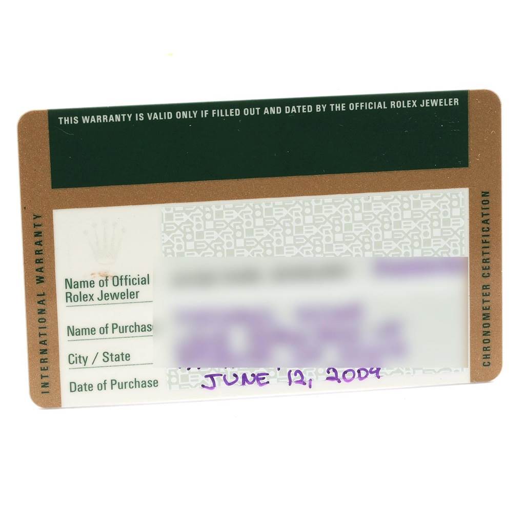 This image shows the international warranty card for a Rolex Daytona 116520 Men's Stainless Steel Black Dial 116520 Men's Stainless Steel Black Dial watch with purchase details filled in.