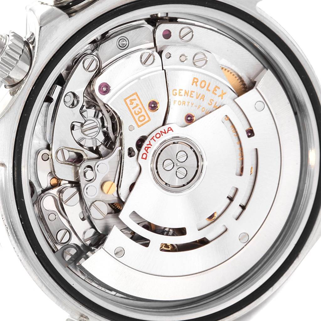 This image shows the intricate internal mechanics of a Rolex Daytona 116520 Men's Stainless Steel Black Dial 116520 Men's Stainless Steel Black Dial watch, highlighting the movement and gears.