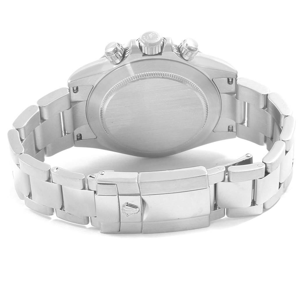 The image shows the back view of a Rolex Daytona 116520 Men's Stainless Steel White Dial 116520 Men's Stainless Steel White Dial watch, highlighting the case back, crown, pushers, and bracelet clasp.