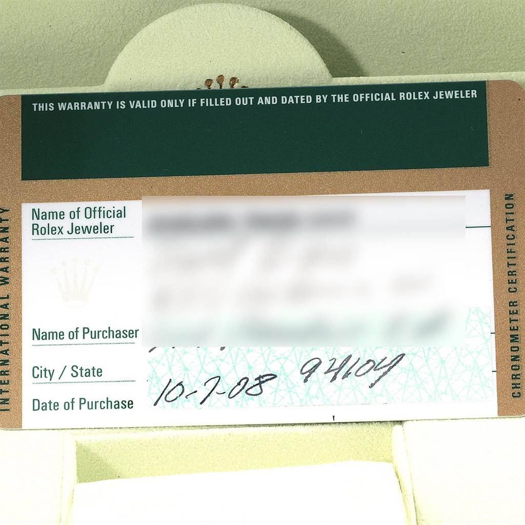 The image shows the international warranty card for a Rolex Daytona 116520 Men's Stainless Steel White Dial 116520 Men's Stainless Steel White Dial watch.