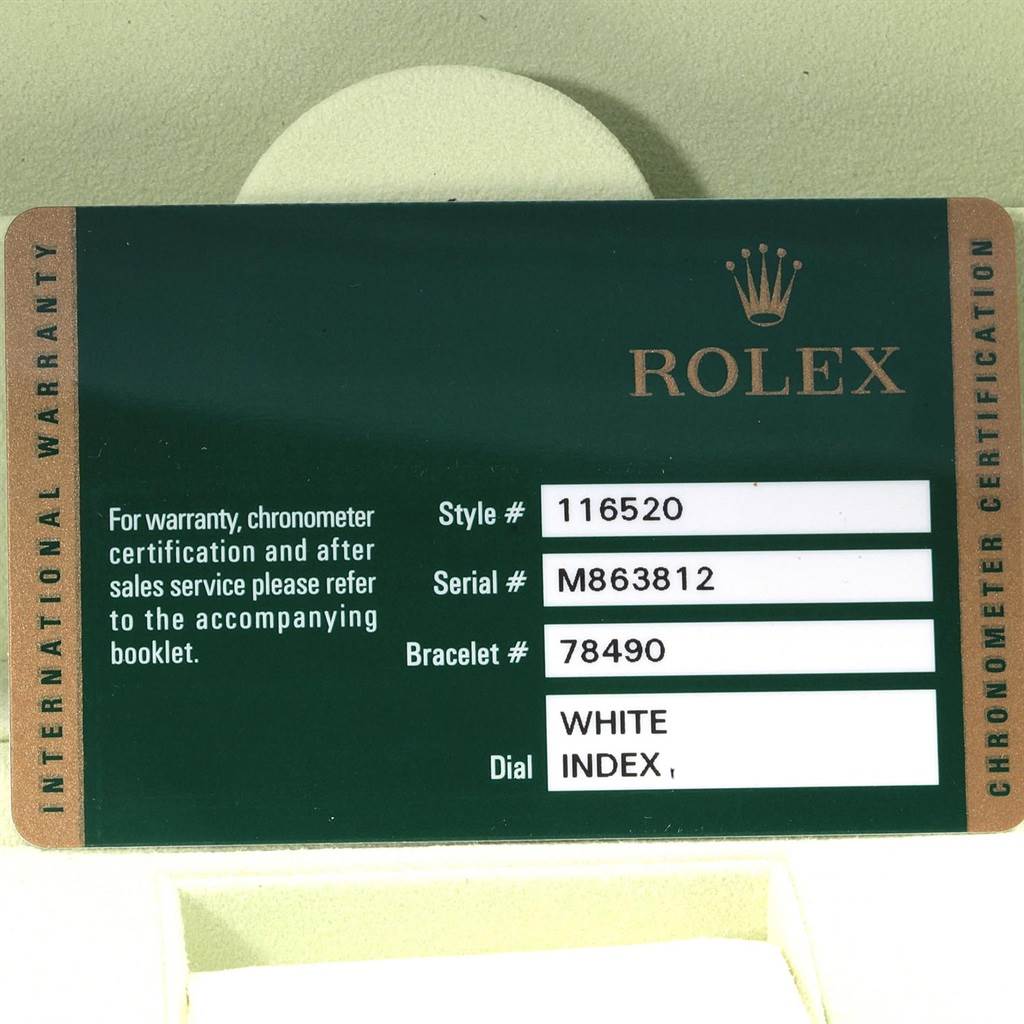 This image shows the warranty card for a Rolex Daytona 116520 Men's Stainless Steel White Dial 116520 Men's Stainless Steel White Dial watch, displaying style, serial, bracelet, and dial information.
