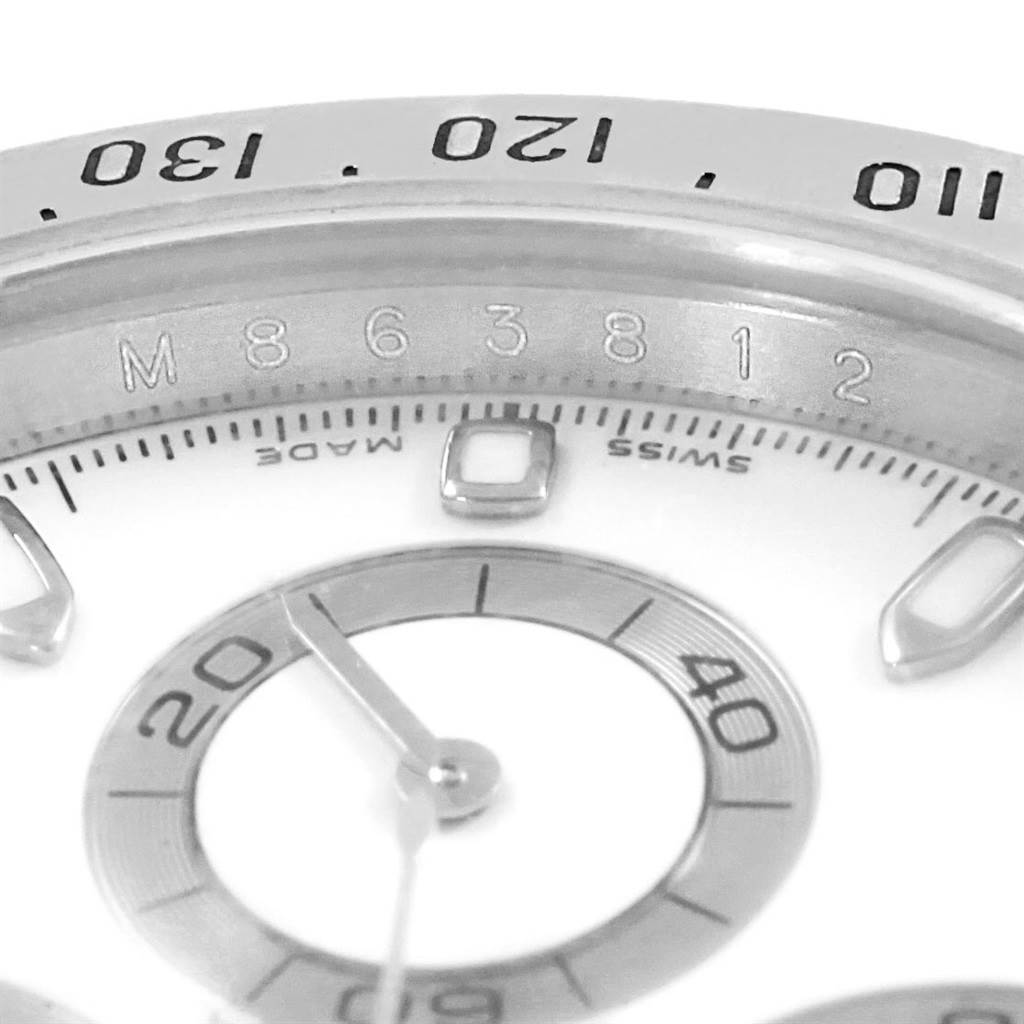 The image shows a close-up angle of the dial and bezel of a Rolex Daytona 116520 Men's Stainless Steel White Dial 116520 Men's Stainless Steel White Dial watch, focusing on the minute markers and sub-dial.