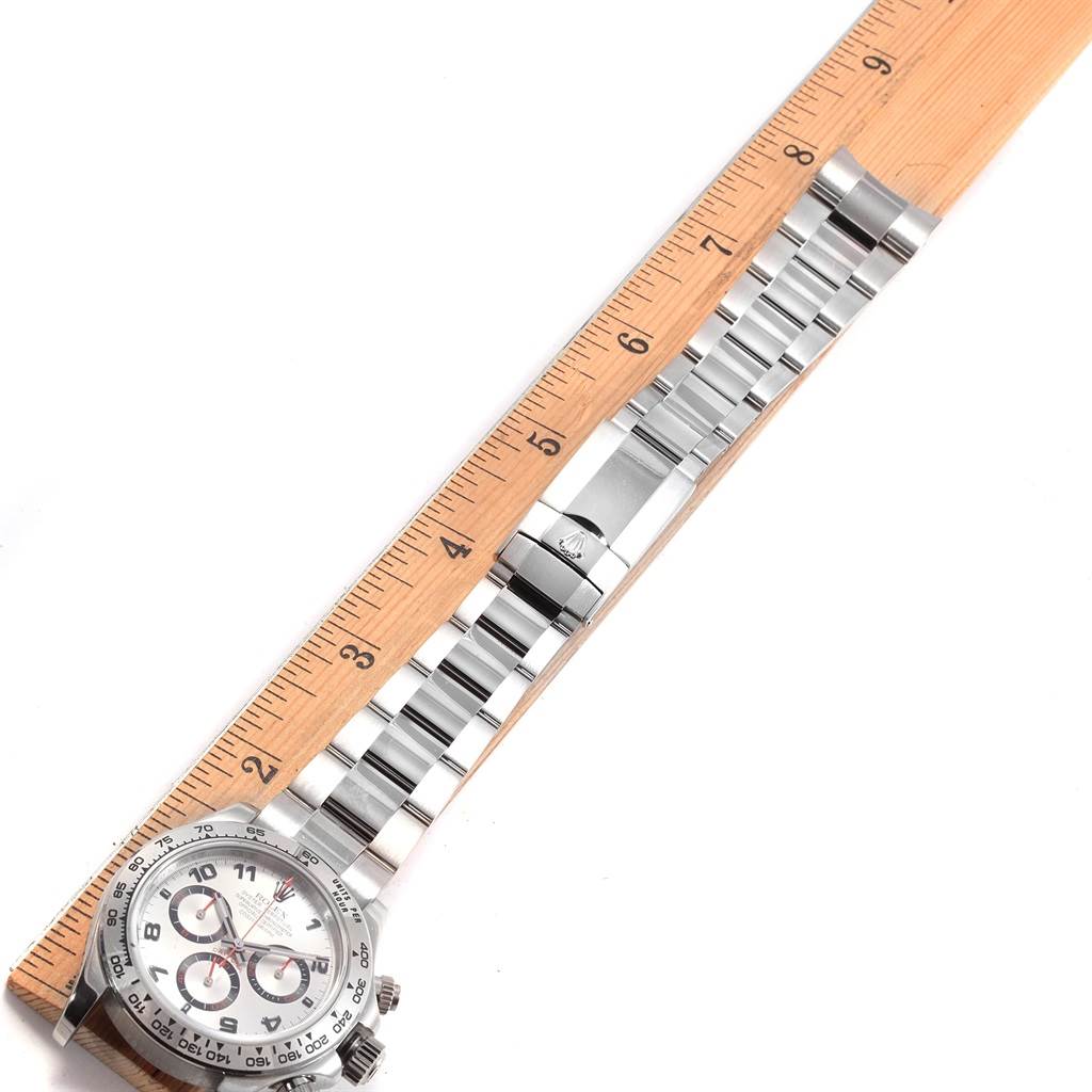The image shows the Rolex Daytona 116509 Men's White Gold Silver Dial 116509 Men's White Gold Silver Dial watch and its stainless steel bracelet next to a ruler, displaying its length and links.