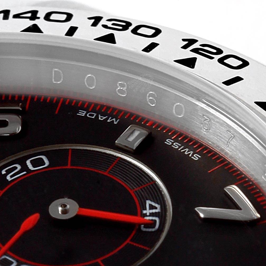 The image shows a close-up of the bezel and dial of a Rolex Daytona 116509 Men's White Gold Black Dial 116509 Men's White Gold Black Dial watch, highlighting the tachymeter scale and part of the chronograph sub-dials.