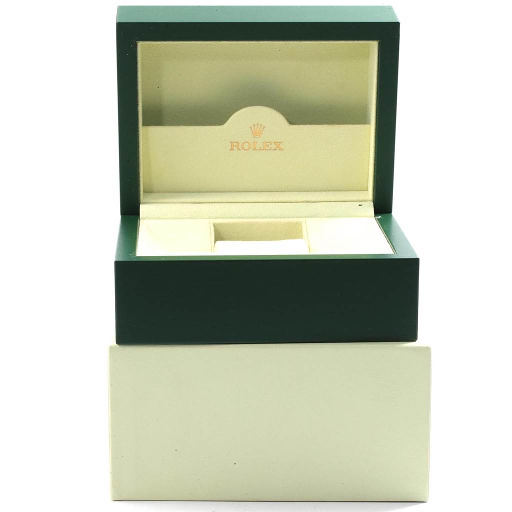 The image shows an open green and cream Rolex Daytona 116520 Men's Stainless Steel White Dial 116520 Men's Stainless Steel White Dial watch box from a front angle.