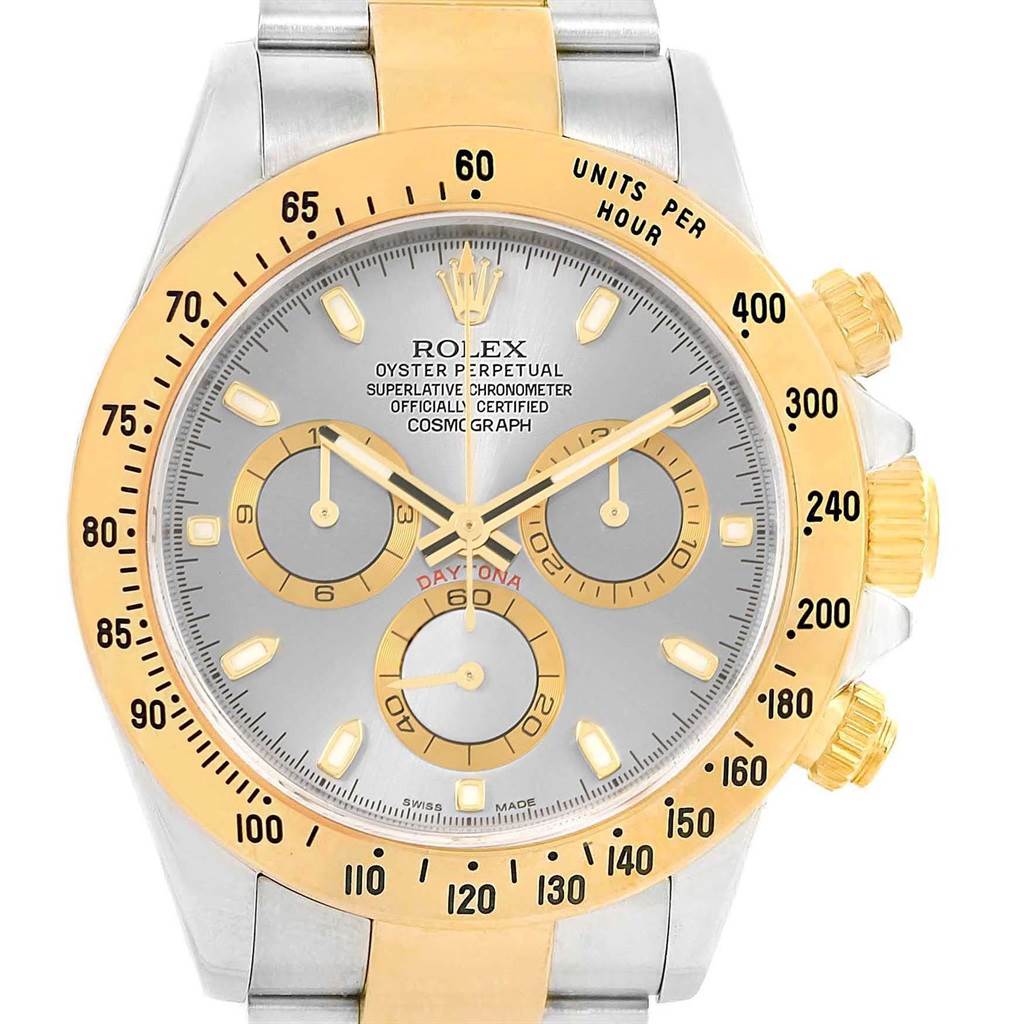 The Rolex Daytona 116523 Men's Steel and Gold (two tone) Grey Dial 116523 Men's Steel and Gold (two tone) Grey Dial watch is shown from a frontal angle, highlighting its dial, bezel, and case.