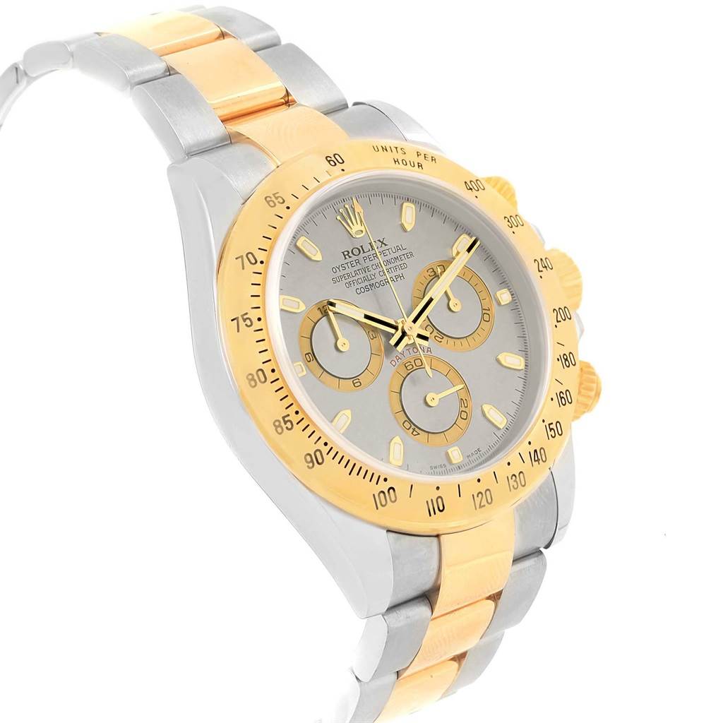 The image shows a Rolex Daytona 116523 Men's Steel and Gold (two tone) Grey Dial 116523 Men's Steel and Gold (two tone) Grey Dial watch at an angled view, highlighting the face, bezel, and two-tone band.
