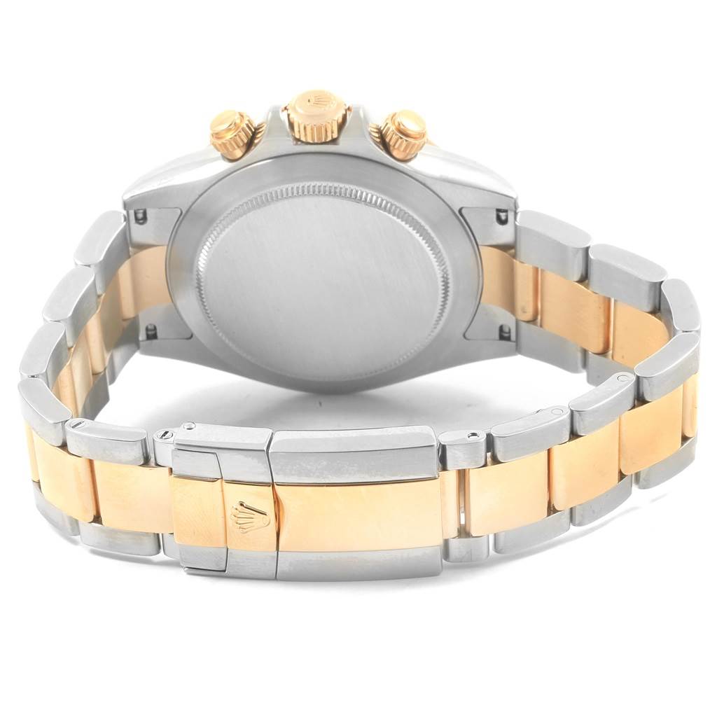 This image shows the back view of a Rolex Daytona 116523 Men's Steel and Gold (two tone) Grey Dial 116523 Men's Steel and Gold (two tone) Grey Dial watch, highlighting the case back, crown, and two-tone bracelet.