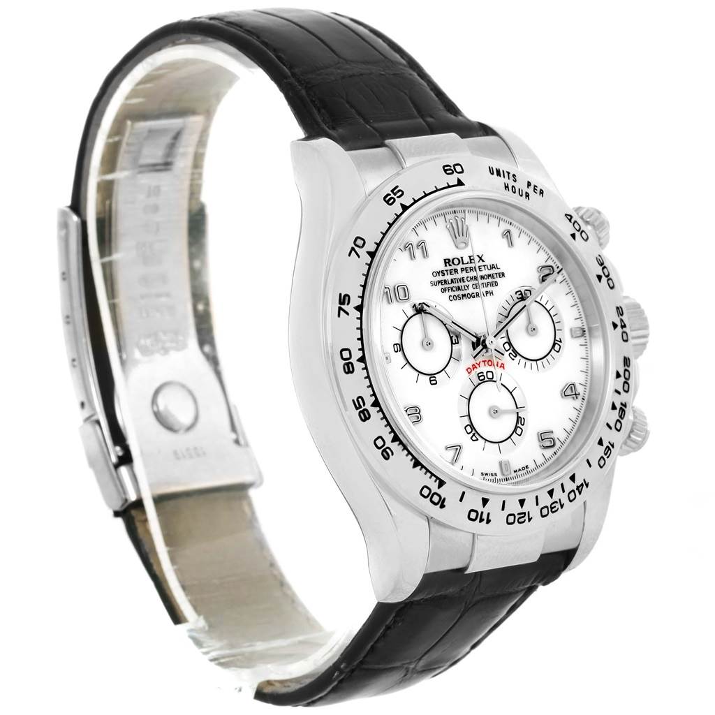 The image shows a side angle of a Rolex Daytona 116519 Men's White Gold White Dial 116519 Men's White Gold White Dial watch with a white dial, black leather strap, and stainless steel casing.