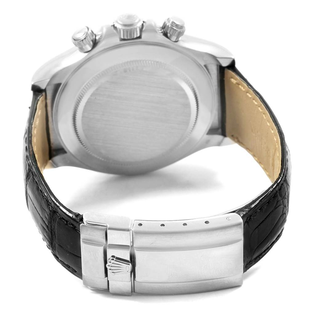 The image shows the back case, crown, pushers, and black leather strap of a Rolex Daytona 116519 Men's White Gold White Dial 116519 Men's White Gold White Dial watch.