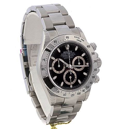 The image shows a Rolex Daytona 116520 Men's Stainless Steel Black Dial 116520 Men's Stainless Steel Black Dial watch from a front-left angle, displaying its bezel, dial, pushers, and bracelet.